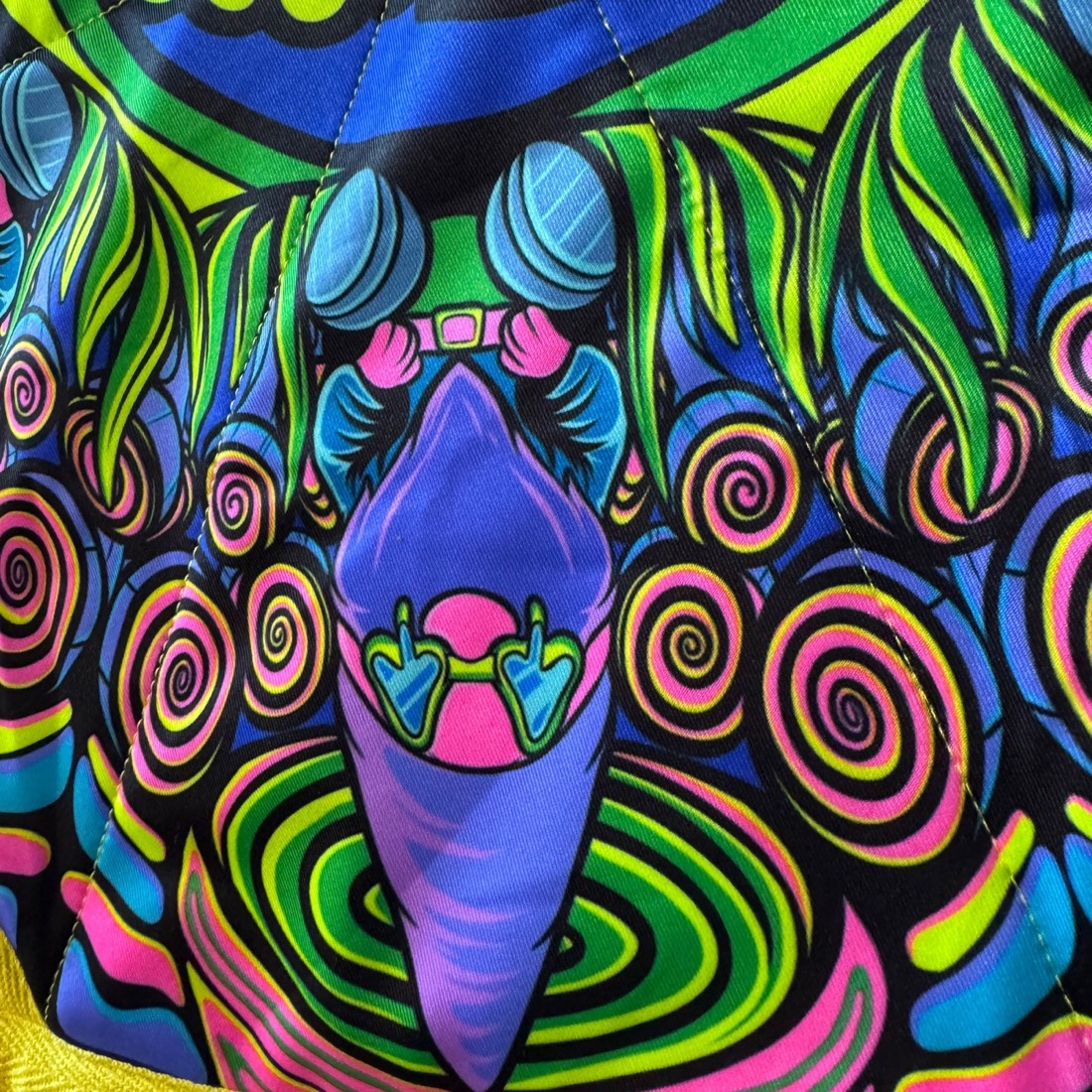 Close-up of the artwork and stitching